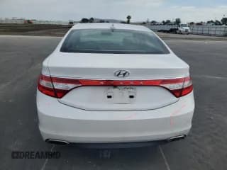 ✅ 2015 Hyundai Azera • VIN: KMHFG4JGXFA440718 • Лот: 87485615. Опубликован ранее на Copart с пробегом 113 556 миль. Бесплатный доступ к архиву аукционных продаж из США и подробный отчёт об истории автомобиля на DreamBid. Изображение 6.