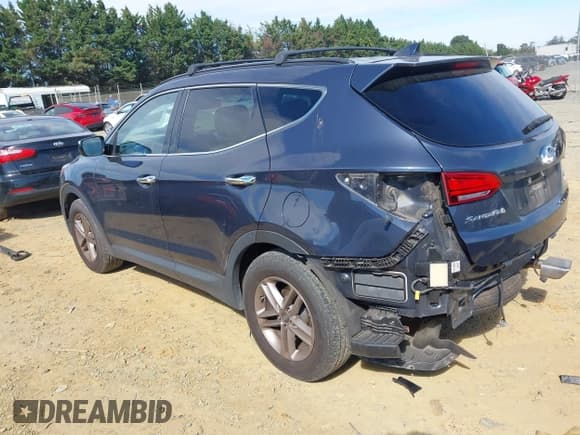 ✅ 2018 Hyundai Santa Fe 2.4L • VIN: 5NMZUDLBXJH059736 • Лот: 43445713. Опубликован ранее на IAAI с пробегом 138 393 миль. Бесплатный доступ к архиву аукционных продаж из США и подробный отчёт об истории автомобиля на DreamBid. Изображение 3.