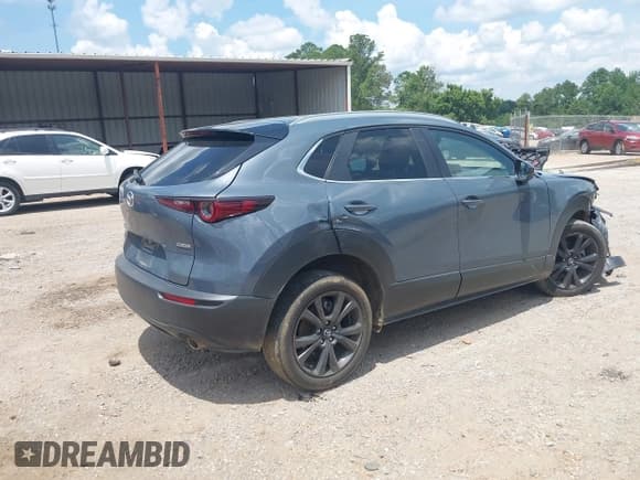 ✅ 2023 Mazda CX-30 S Preferred • VIN: 3MVDMBCM1PM531097 • Lot: 42584635. Listed on IAAI with 56,161 mi. Free auction sales archive from the USA and detailed vehicle history report at DreamBid. Image 4.