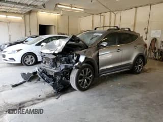 ✅ 2017 Hyundai Santa Fe Ultimate • VIN: 5XYZW4LA5HG497506 • Лот: 66890923. Опубликован ранее на Copart с пробегом Не указан. Бесплатный доступ к архиву аукционных продаж из США и подробный отчёт об истории автомобиля на DreamBid. Изображение 1.