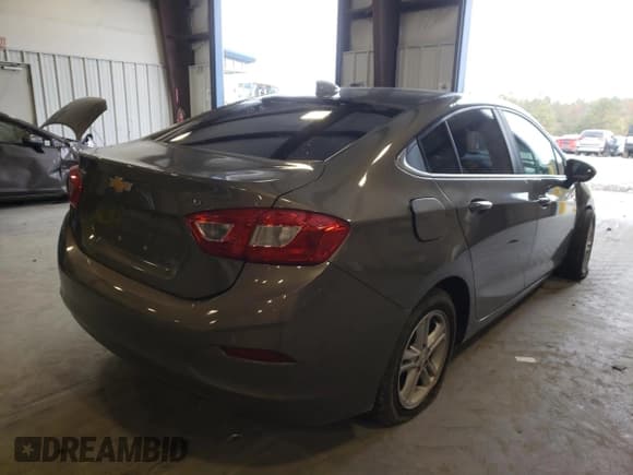 ✅ 2017 Chevrolet Cruze LT • VIN: 1G1BE5SM5H7208197 • Lot: 65516122. Listed on Copart with 100,873 mi. Free auction sales archive from the USA and detailed vehicle history report at DreamBid. Image 4.