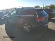 ✅ 2014 Jeep Grand Cherokee Overland • VIN: 1C4RJFCG9EC431684 • Lot: 84038665. Listed on Copart with 140,795 mi. Free auction sales archive from the USA and detailed vehicle history report at DreamBid. Image 2.