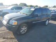 ✅ 2006 GMC Envoy SLT • VIN: 1GKDS13S262197642 • Lot: 42694689. Listed on IAAI with 130,620 mi. Free auction sales archive from the USA and detailed vehicle history report at DreamBid. Image 2.