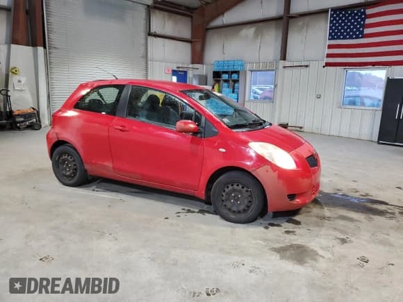 ✅ 2008 Toyota Yaris • VIN: JTDJT923285182516 • Lot: 90860295. Listed on Copart with 115,311 mi. Free auction sales archive from the USA and detailed vehicle history report at DreamBid. Image 4.