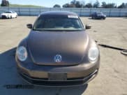 ✅ 2014 Volkswagen Beetle 2.0L TDI • VIN: 3VWJL7AT0EM662093 • Лот: 50435195. Опубликован ранее на Copart с пробегом 76 897 миль. Бесплатный доступ к архиву аукционных продаж из США и подробный отчёт об истории автомобиля на DreamBid. Изображение 5.