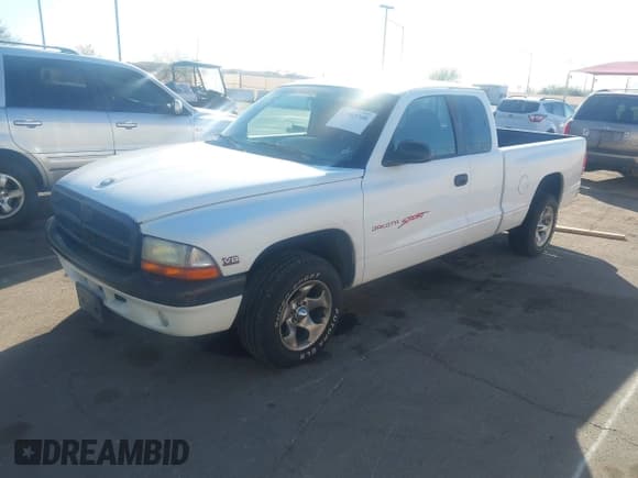 ✅ 1997 Dodge Dakota • VIN: 1B7GL23Y6VS207961 • Lot: 43703708. Wystawiony na IAAI z przebiegiem 297 431 mil. Bezpłatny archiwum sprzedaży aukcyjnych z USA i szczegółowy raport historii pojazdu na DreamBid. Zdjęcie 2.