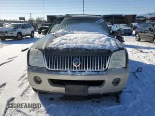 ✅ 2004 Mercury Mountaineer Convenience • VIN: 4M2ZU86K04ZJ43478 • Lot: 42244735. Wystawiony na Copart z przebiegiem 190 892 mil. Bezpłatny archiwum sprzedaży aukcyjnych z USA i szczegółowy raport historii pojazdu na DreamBid. Zdjęcie 5.