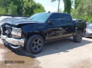 ✅ 2016 Chevrolet Silverado 1500 LT • VIN: 3GCUKREC8GG148633 • Lot: 42904875. Wystawiony na IAAI z przebiegiem 158 654 mil. Bezpłatny archiwum sprzedaży aukcyjnych z USA i szczegółowy raport historii pojazdu na DreamBid. Zdjęcie 18.