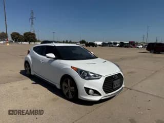 ✅ 2015 Hyundai Veloster Turbo • VIN: KMHTC6AE1FU230029 • Lot: 74982304. Listed on Copart with 121,447 mi. Free auction sales archive from the USA and detailed vehicle history report at DreamBid. Image 1.
