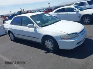 1999 Honda Accord LX z VIN JHMCG5644XC001482, wystawiony jako IAAI lot #43166852 z przebiegiem 315 312 mil mil oraz . Historia ofert i sprzedaży dostępna na DreamBid. Obrazek 1.