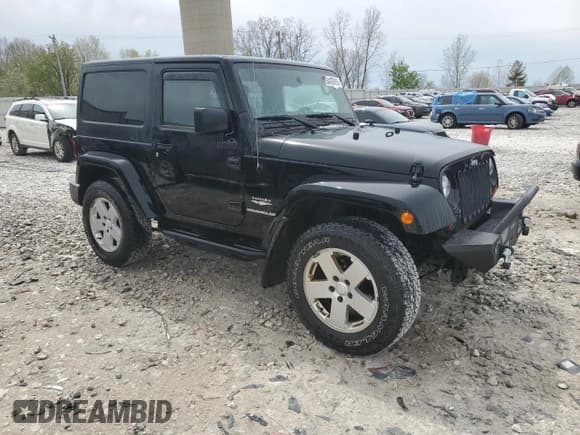 ✅ 2011 Jeep Wrangler Sahara • VIN: 1J4AA5D19BL543294 • Lot: 54426285. Listed on Copart with 151,912 mi. Free auction sales archive from the USA and detailed vehicle history report at DreamBid. Image 4.