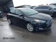 ✅ 2017 Ford Focus Titanium • VIN: 1FADP3J26HL267951 • Lot: 43728220. Listed on IAAI with 84,043 mi. Free auction sales archive from the USA and detailed vehicle history report at DreamBid. Image 1.