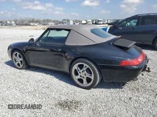 ✅ 1997 Porsche 911 • VIN: WP0CA299XVS340470 • Лот: 43736815. Опубликован ранее на Copart с пробегом 74 146 миль. Бесплатный доступ к архиву аукционных продаж из США и подробный отчёт об истории автомобиля на DreamBid. Изображение 2.