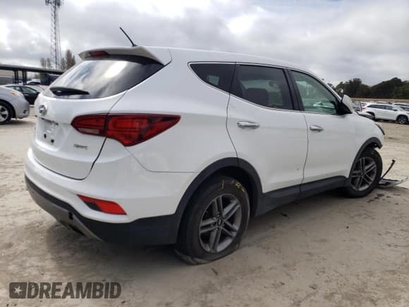 ✅ 2018 Hyundai Santa Fe 2.4L • VIN: 5NMZT3LB0JH069656 • Лот: 49268604. Опубликован ранее на Copart с пробегом 95 553 миль. Бесплатный доступ к архиву аукционных продаж из США и подробный отчёт об истории автомобиля на DreamBid. Изображение 3.