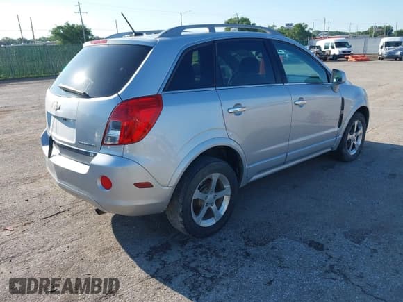 ✅ 2013 Chevrolet Captiva Sport LT • VIN: 3GNAL3EK0DS606055 • Lot: 42363445. Wystawiony na IAAI z przebiegiem 134 331 mil. Bezpłatny archiwum sprzedaży aukcyjnych z USA i szczegółowy raport historii pojazdu na DreamBid. Zdjęcie 4.