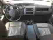 2008 Dodge Dakota Laramie z VIN 1D7HW58N18S517697, wystawiony jako Copart lot #61007934 z przebiegiem Nie podano mil oraz Szkoda całkowita • Salvage title. Historia ofert i sprzedaży dostępna na DreamBid. Obrazek 8.