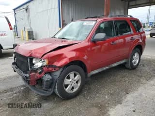 ✅ 2009 Ford Escape XLS • VIN: 1FMCU02759KA42883 • Lot: 71436375. Listed on Copart with 143,592 mi. Free auction sales archive from the USA and detailed vehicle history report at DreamBid. Image 1.