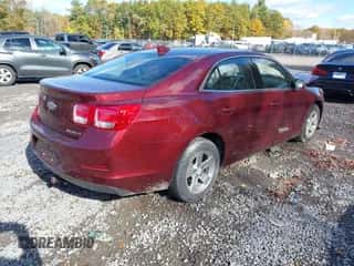 2015 Chevrolet Malibu LT z VIN 1G11C5SL8FF288901, wystawiony jako IAAI lot #43493131 z przebiegiem 59 599 mil mil oraz . Historia ofert i sprzedaży dostępna na DreamBid. Obrazek 4.