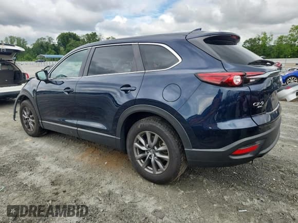✅ 2022 Mazda CX-9 Sport • VIN: JM3TCBBY9N0608178 • Лот: 63288935. Опубликован ранее на Copart с пробегом 70 505 миль. Бесплатный доступ к архиву аукционных продаж из США и подробный отчёт об истории автомобиля на DreamBid. Изображение 2.