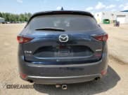 ✅ 2021 Mazda CX-5 Touring • VIN: JM3KFACM7M0113548 • Лот: 66671995. Опубликован ранее на Copart с пробегом 75 399 миль. Бесплатный доступ к архиву аукционных продаж из США и подробный отчёт об истории автомобиля на DreamBid. Изображение 6.
