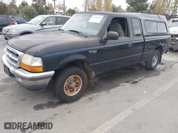 ✅ 1998 Ford Ranger XL • VIN: 1FTYR14X4WPA52172 • Lot: 43760724. Listed on IAAI with 165,679 mi. Free auction sales archive from the USA and detailed vehicle history report at DreamBid. Image 2.