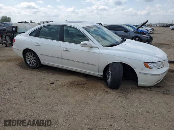 2008 Hyundai Azera Limited с VIN KMHFC46F78A333821, выставлен на аукционе Copart как лот 61246295 с пробегом 129 859 миль миль и Списание • Salvage title. История ставок и продаж доступна на DreamBid. Изображение 4.