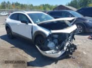 ✅ 2023 Mazda CX-30 Premium • VIN: 3MVDMBDY8PM583652 • Lot: 42221466. Listed on IAAI with 56,845 mi. Free auction sales archive from the USA and detailed vehicle history report at DreamBid. Image 1.