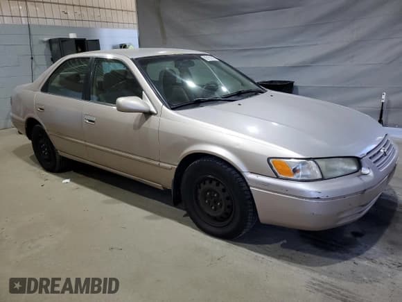 ✅ 1997 Toyota Camry LE • VIN: 4T1BG22K1VU820405 • Lot: 85151315. Listed on Copart with 265,227 mi. Free auction sales archive from the USA and detailed vehicle history report at DreamBid. Image 4.