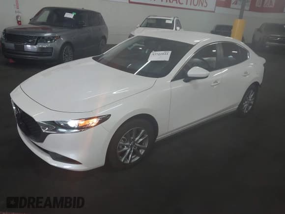 ✅ 2025 Mazda 3 S • VIN: JM1BPAAM4S1767486 • Лот: 43721844. Опубликован ранее на IAAI с пробегом 24 952 миль. Бесплатный доступ к архиву аукционных продаж из США и подробный отчёт об истории автомобиля на DreamBid. Изображение 18.