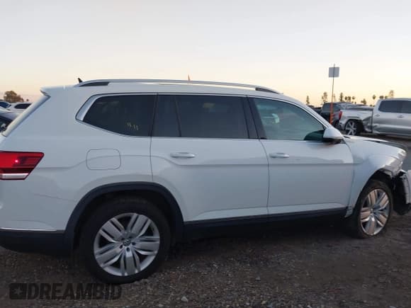 ✅ 2018 Volkswagen Atlas SEL Premium • VIN: 1V2NR2CA6JC537949 • Лот: 43666355. Опубликован ранее на IAAI с пробегом 62 238 миль. Бесплатный доступ к архиву аукционных продаж из США и подробный отчёт об истории автомобиля на DreamBid. Изображение 13.