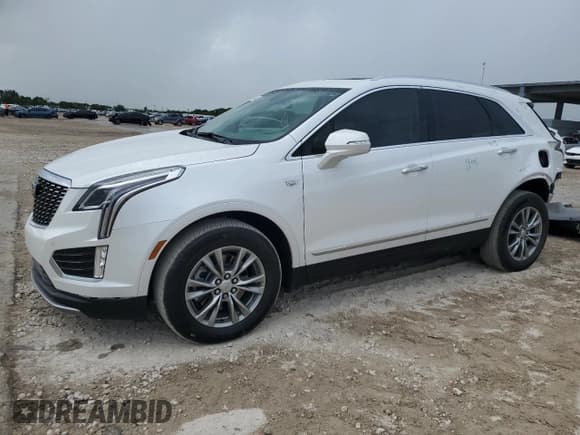 ✅ 2022 Cadillac XT5 FWD Premium Luxury • VIN: 1GYKNCRS0NZ175748 • Lot: 61651885. Listed on Copart with 13,747 mi. Free auction sales archive from the USA and detailed vehicle history report at DreamBid. Image 1.
