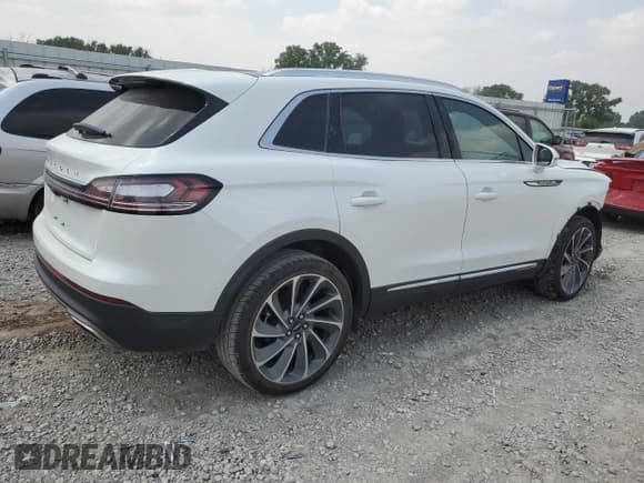 ✅ 2022 Lincoln Nautilus Reserve • VIN: 2LMPJ6K96NBL05521 • Лот: 66693045. Опубликован ранее на Copart с пробегом 23 259 миль. Бесплатный доступ к архиву аукционных продаж из США и подробный отчёт об истории автомобиля на DreamBid. Изображение 3.