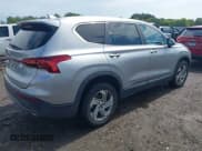 ✅ 2021 Hyundai Santa Fe SE • VIN: 5NMS1DAJ5MH329724 • Lot: 43245906. Listed on IAAI with 67,954 mi. Free auction sales archive from the USA and detailed vehicle history report at DreamBid. Image 4.