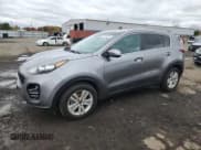 ✅ 2018 Kia Sportage LX • VIN: KNDPMCAC4J7379073 • Lot: 90990035. Wystawiony na Copart z przebiegiem 85 918 mil. Bezpłatny archiwum sprzedaży aukcyjnych z USA i szczegółowy raport historii pojazdu na DreamBid. Zdjęcie 1.