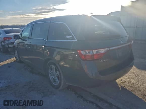 ✅ 2012 Honda Odyssey Touring • VIN: 5FNRL5H96CB040569 • Lot: 94888225. Listed on Copart with Not provided. Free auction sales archive from the USA and detailed vehicle history report at DreamBid. Image 2.