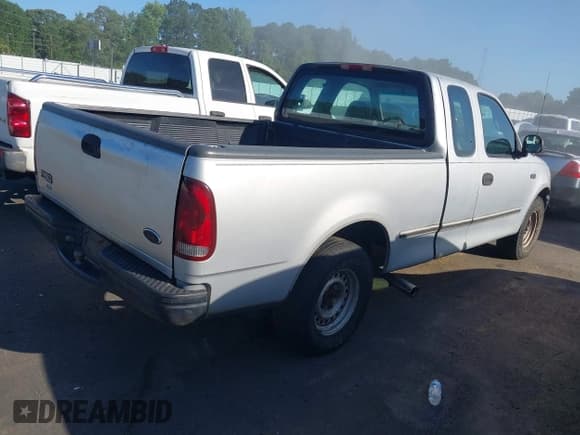 ✅ 1997 Ford F-150 • VIN: 1FTDX172XVNA70741 • Lot: 42748761. Listed on IAAI with 165,335 mi. Free auction sales archive from the USA and detailed vehicle history report at DreamBid. Image 4.