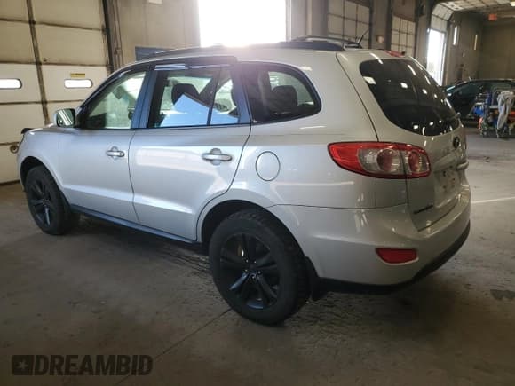 ✅ 2012 Hyundai Santa Fe GLS • VIN: 5XYZG3AB9CG118681 • Lot: 77802964. Listed on Copart with 140,465 mi. Free auction sales archive from the USA and detailed vehicle history report at DreamBid. Image 2.