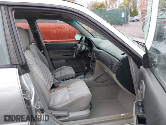 ✅ 2004 Subaru Forester XS • VIN: JF1SG65604H721338 • Lot: 43562108. Listed on IAAI with 194,707 mi. Free auction sales archive from the USA and detailed vehicle history report at DreamBid. Image 5.