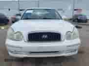 2004 Hyundai Sonata GLS z VIN KMHWF35H14A996574, wystawiony jako IAAI lot #42458020 z przebiegiem 167 012 mil mil oraz . Historia ofert i sprzedaży dostępna na DreamBid. Obrazek 12.