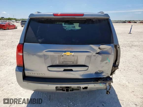 2020 Chevrolet Suburban LS z VIN 1GNSCGKC5LR282191, wystawiony jako Copart lot #69212835 z przebiegiem 127 042 mil mil oraz Szkoda całkowita • Salvage title. Historia ofert i sprzedaży dostępna na DreamBid. Obrazek 6.