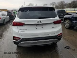 ✅ 2019 Hyundai Santa Fe Ultimate • VIN: 5NMS5CAA4KH021309 • Лот: 36098413. Опубликован ранее на Copart с пробегом 76 221 миль. Бесплатный доступ к архиву аукционных продаж из США и подробный отчёт об истории автомобиля на DreamBid. Изображение 6.