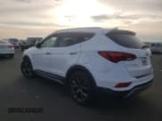 ✅ 2017 Hyundai Santa Fe Ultimate • VIN: 5XYZWDLA0HG496733 • Лот: 77305753. Опубликован ранее на Copart с пробегом 66 774 миль. Бесплатный доступ к архиву аукционных продаж из США и подробный отчёт об истории автомобиля на DreamBid. Изображение 2.