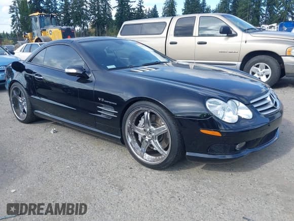 ✅ 2005 Mercedes-Benz SL 55 AMG • VIN: WDBSK74F65F099663 • Lot: 43377046. Listed on IAAI with 31,050 mi. Free auction sales archive from the USA and detailed vehicle history report at DreamBid. Image 1.