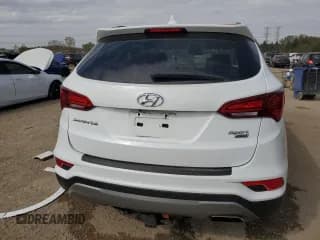✅ 2018 Hyundai Santa Fe 2.4L • VIN: 5NMZUDLB5JH065895 • Лот: 85318895. Опубликован ранее на Copart с пробегом 54 993 миль. Бесплатный доступ к архиву аукционных продаж из США и подробный отчёт об истории автомобиля на DreamBid. Изображение 6.