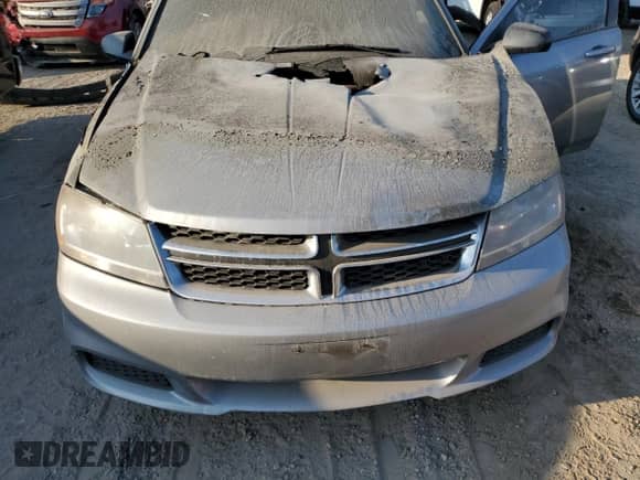 2014 Dodge Avenger SE z VIN 1C3CDZAB1EN129465, wystawiony jako Copart lot #71725154 z przebiegiem Nie podano mil oraz Szkoda całkowita • Salvage title. Historia ofert i sprzedaży dostępna na DreamBid. Obrazek 11.