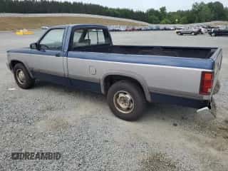1991 Dodge Dakota S z VIN 1B7FL26Y5MS364290, wystawiony jako Copart lot #56398945 z przebiegiem 98 390 mil mil oraz Szkoda całkowita • Salvage title. Historia ofert i sprzedaży dostępna na DreamBid. Obrazek 2.