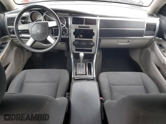 2007 Dodge Charger с VIN 2B3KA43G27H748889, выставлен на аукционе Copart как лот 65184184 с пробегом 89 150 миль миль и Списание • Salvage title. История ставок и продаж доступна на DreamBid. Изображение 8.