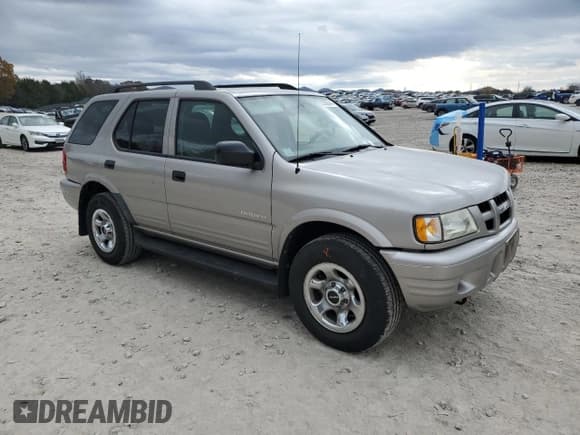 ✅ 2004 Isuzu Rodeo S • VIN: 4S2CK58Y744305349 • Lot: 82386444. Listed on Copart with 162,752 mi. Free auction sales archive from the USA and detailed vehicle history report at DreamBid. Image 3.