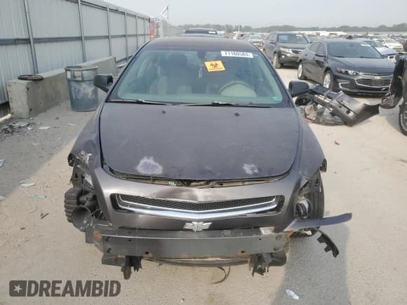 ✅ 2010 Chevrolet Malibu 1LS • VIN: 1G1ZB5EBXA4137443 • Lot: 71160584. Listed on Copart with 232,295 mi. Free auction sales archive from the USA and detailed vehicle history report at DreamBid. Image 5.