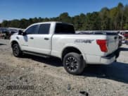 ✅ 2016 Nissan Titan Platinum Reserve • VIN: 1N6BA1F49GN517099 • Lot: 82692335. Listed on Copart with 107,942 mi. Free auction sales archive from the USA and detailed vehicle history report at DreamBid. Image 2.